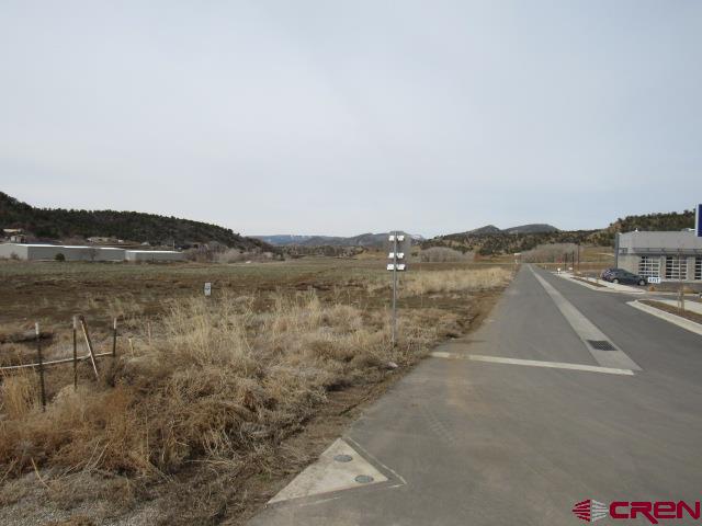 Tbd Ewing Mesa Road Durango, CO 81301 - Photo 5 of 9 a view of a lake with houses in the back