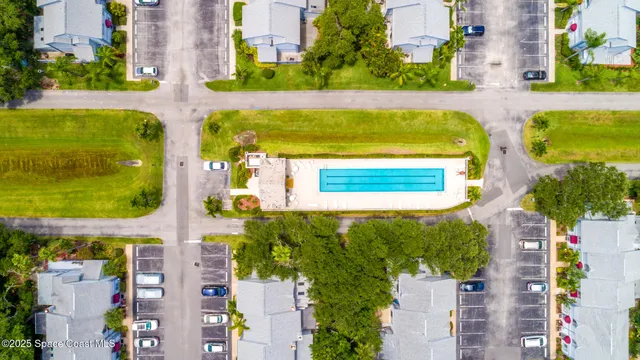 a view of a chairs and table on wooden floor