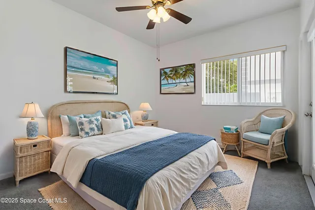 a bedroom with bed and window