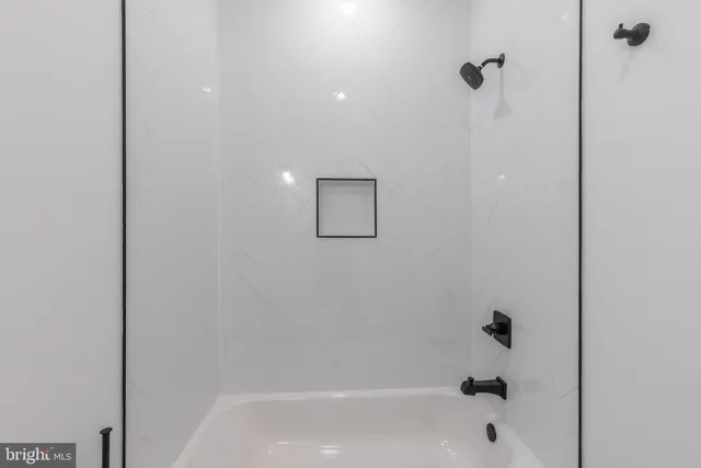 a view of small space with wooden floor