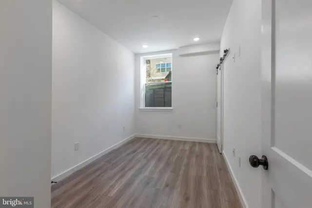 a kitchen with cabinets and stainless steel appliances