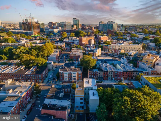 a view of room with wooden floor