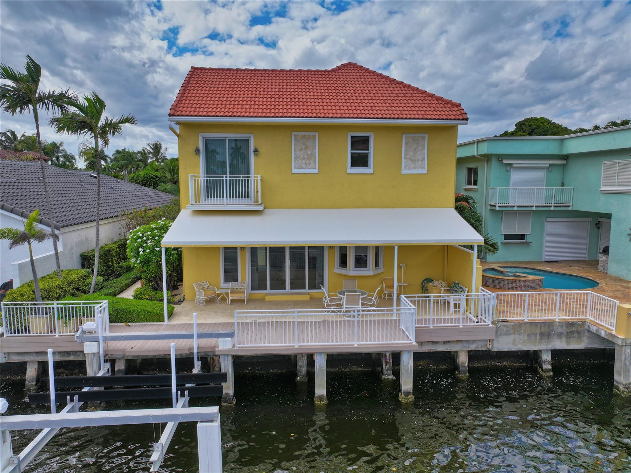 3585 Admirals Way Delray Beach, FL 33483 - Photo 64 of 76 Boat lift and dock