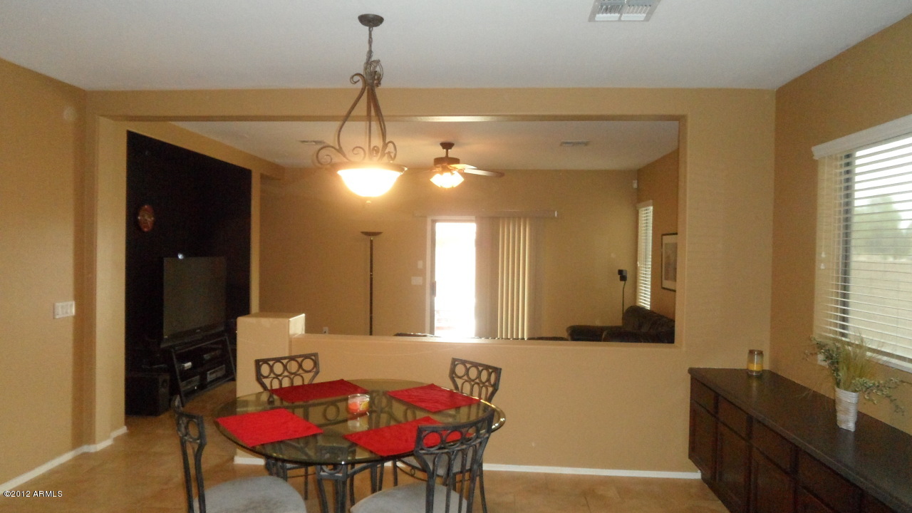 45298 Portabello Road Maricopa, AZ 85139 - Photo 11 of 30 Eat in Kitchen Open to Family Rm