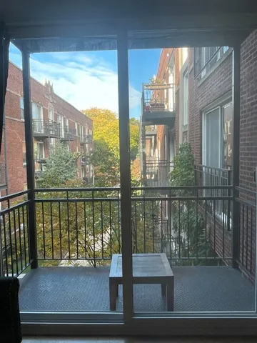 a view of a balcony with lake view
