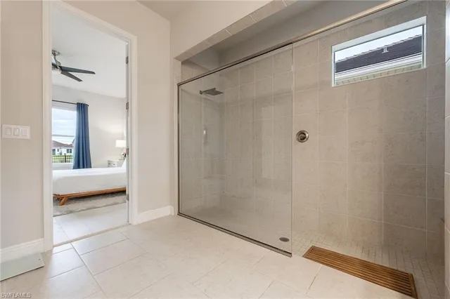 a bedroom with a bed and a view of bathroom