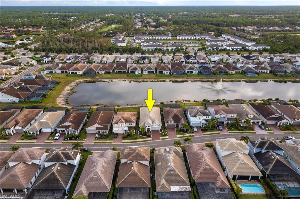 3509 Pilot Circle Naples, FL 34120 - Photo 40 of 50 an aerial view of a city with lake view