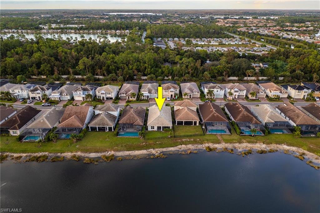 3509 Pilot Circle Naples, FL 34120 - Photo 43 of 50 a view of a town with mountains in the background