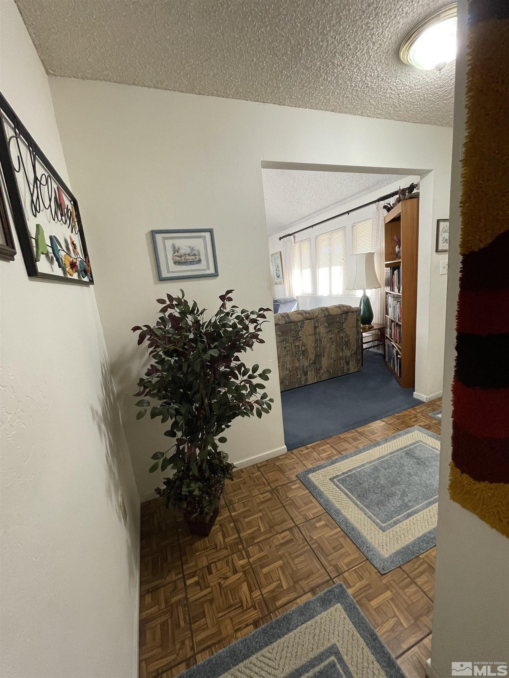 1234 Conway Lane Reno, NV 89503 - Photo 3 of 11 a living room with furniture and a window