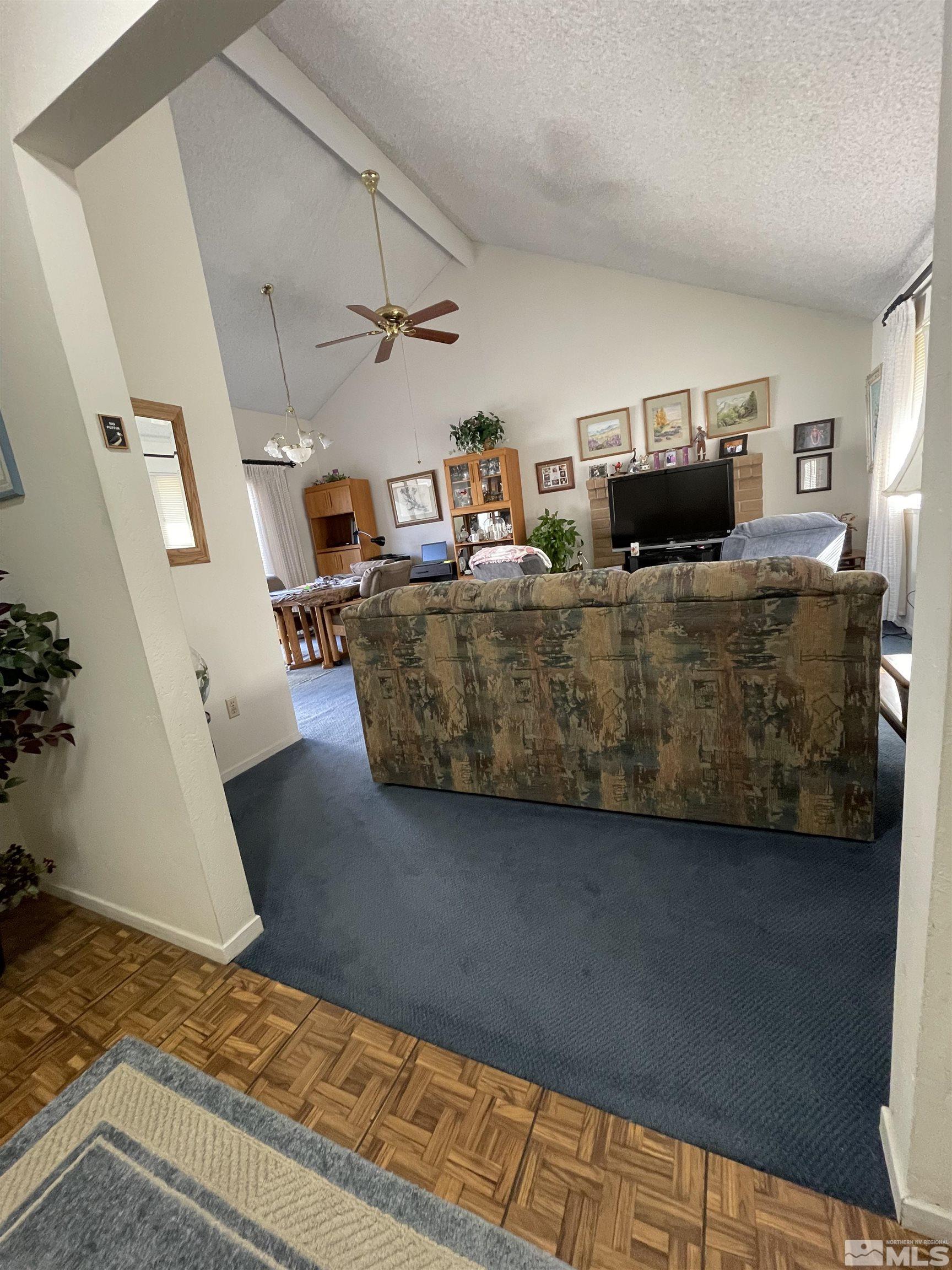 1234 Conway Lane Reno, NV 89503 - Photo 4 of 11 a living room with furniture and a couch