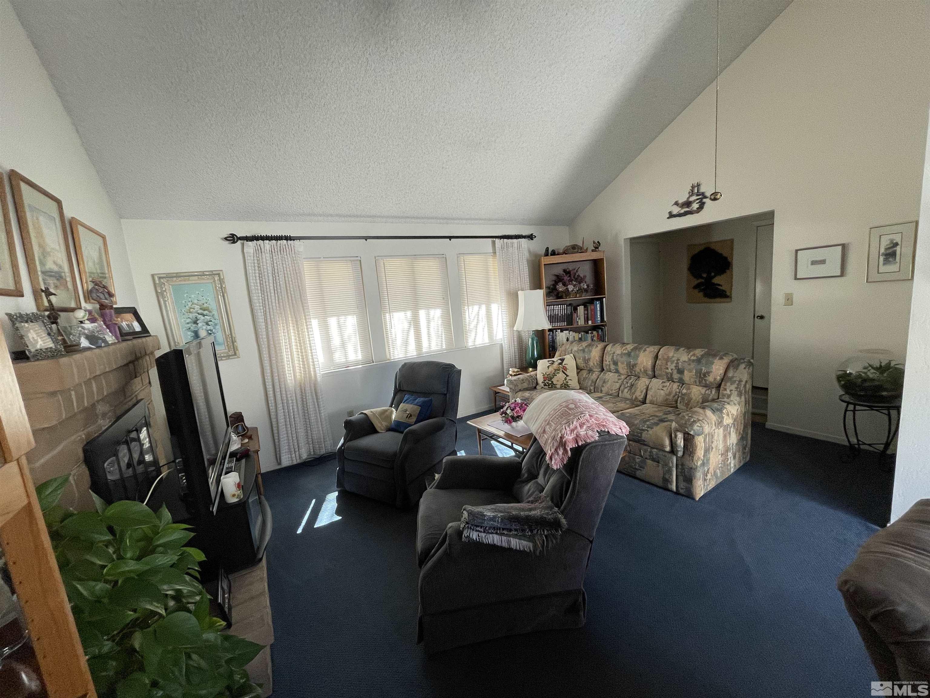 1234 Conway Lane Reno, NV 89503 - Photo 5 of 11 a bed room with furniture and a window