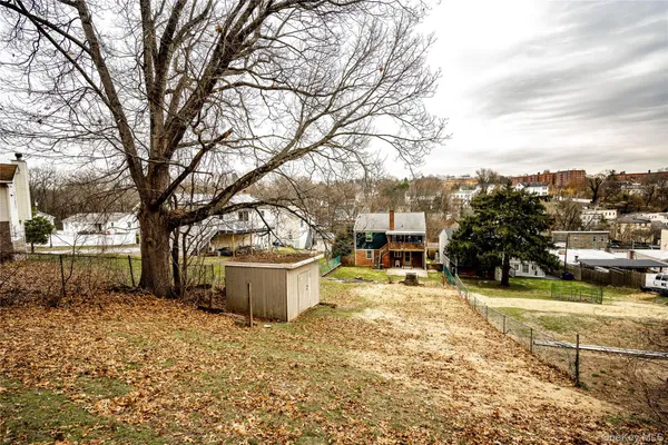 a bathroom with a sink toilet and mirror