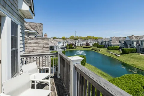 a spacious bathroom with a double vanity sink mirror and shower