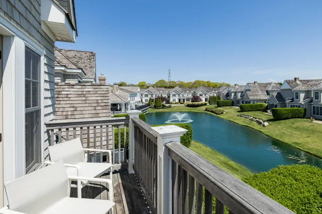 a spacious bathroom with a double vanity sink mirror and shower