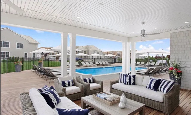 a view of a garden with a building in the background