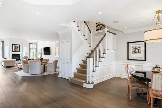 a kitchen with granite countertop kitchen island and stainless steel appliances