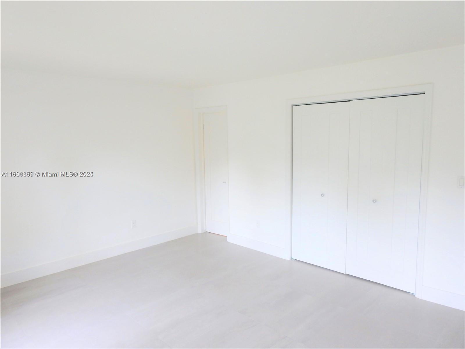 9807 Southwest 93rd Street, Unit 9807 Miami, FL 33176 - Photo 32 of 50 a view of an empty room