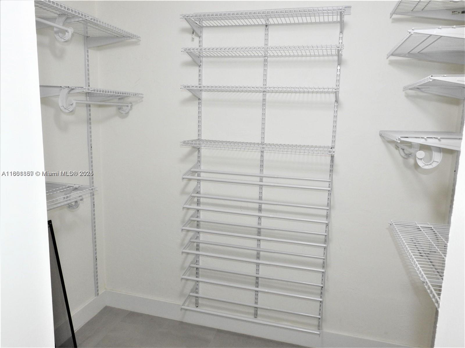 9807 Southwest 93rd Street, Unit 9807 Miami, FL 33176 - Photo 46 of 50 a view of walk in closet