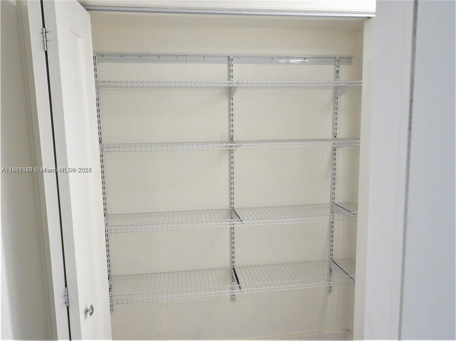 9807 Southwest 93rd Street, Unit 9807 Miami, FL 33176 - Photo 49 of 50 a close view of closet