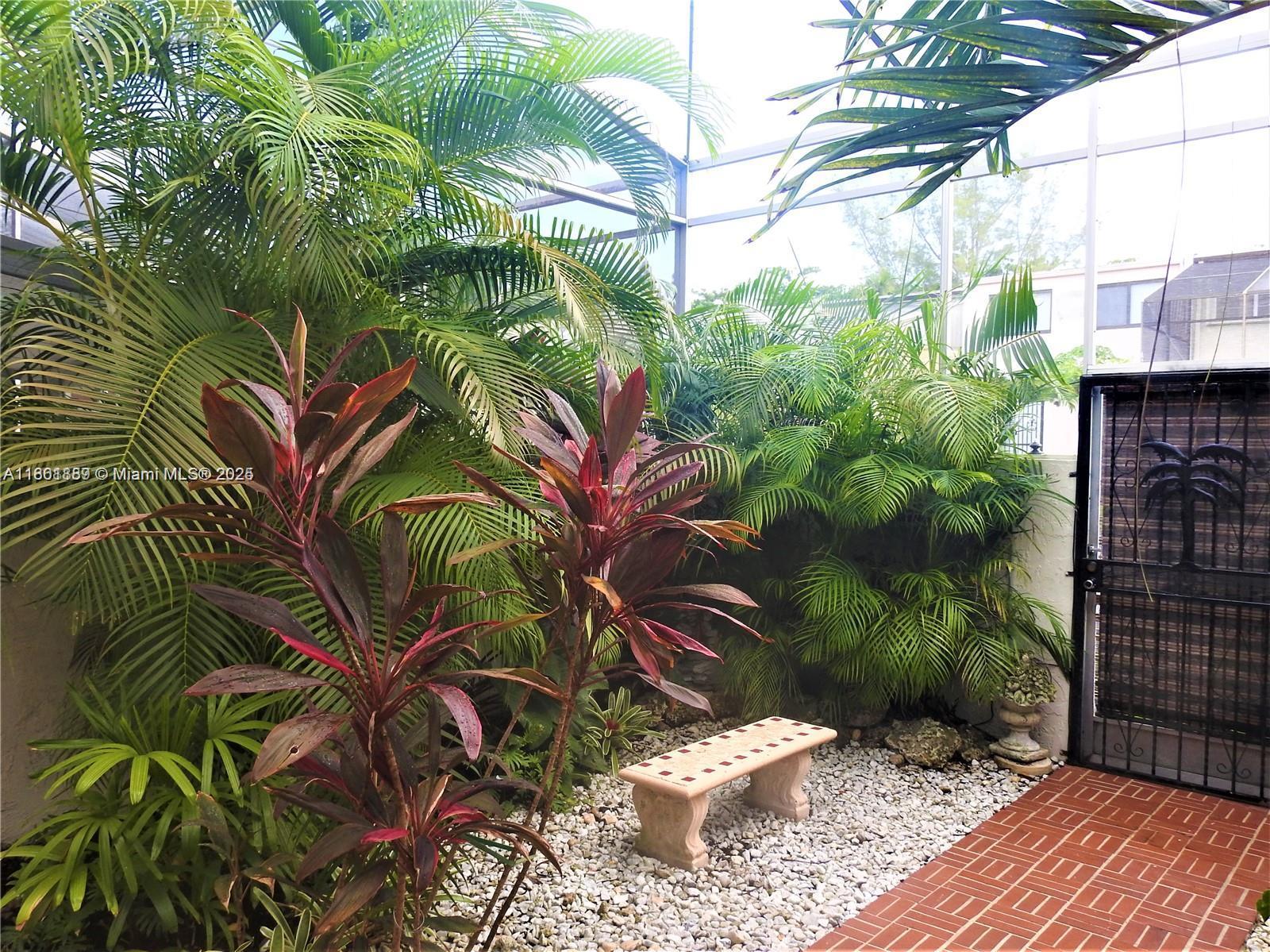 9807 Southwest 93rd Street, Unit 9807 Miami, FL 33176 - Photo 9 of 50 a view of a backyard