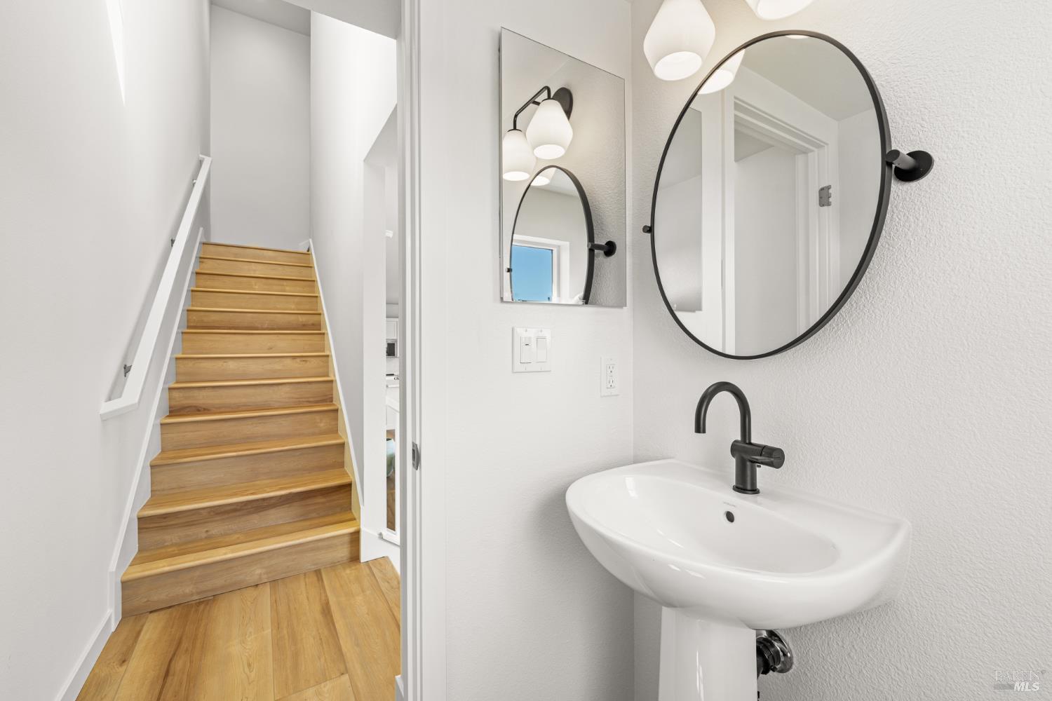 1480 Waterside Lane Rohnert Park, CA 94928 - Photo 16 of 35 a bathroom with a sink and a mirror