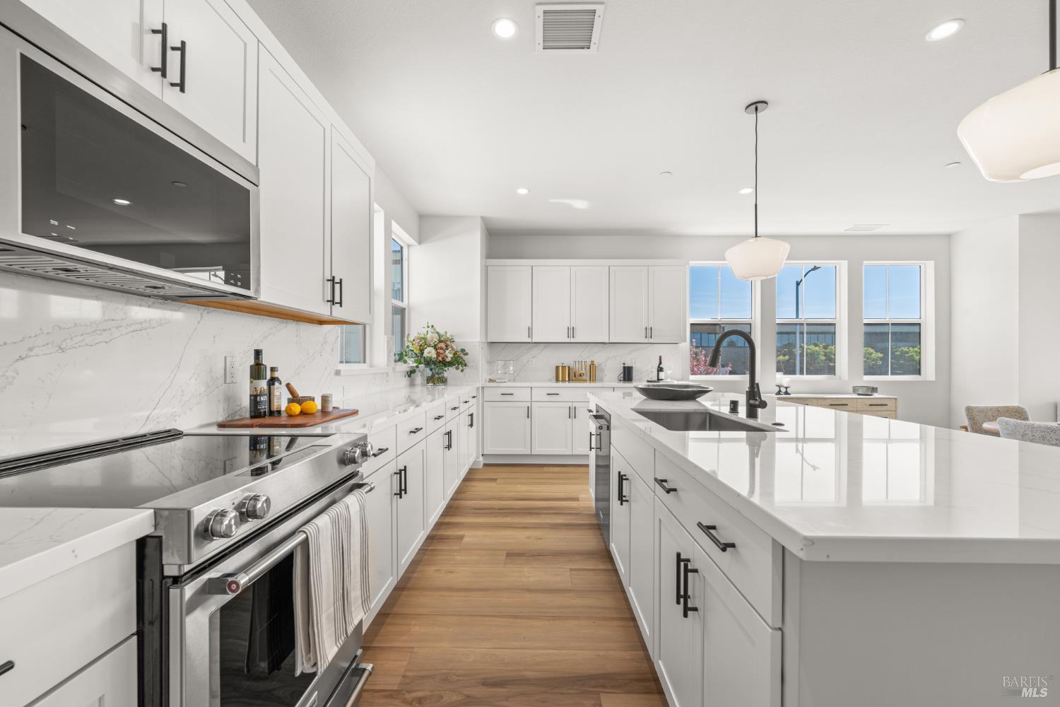 1480 Waterside Lane Rohnert Park, CA 94928 - Photo 3 of 35 a large kitchen with stainless steel appliances granite countertop a lot of counter space