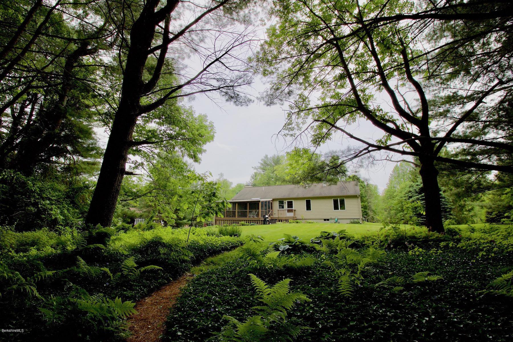 22 Old Barn Road Lenox, MA 01240 - Photo 12 of 37 a view of a house with a tree in a yard