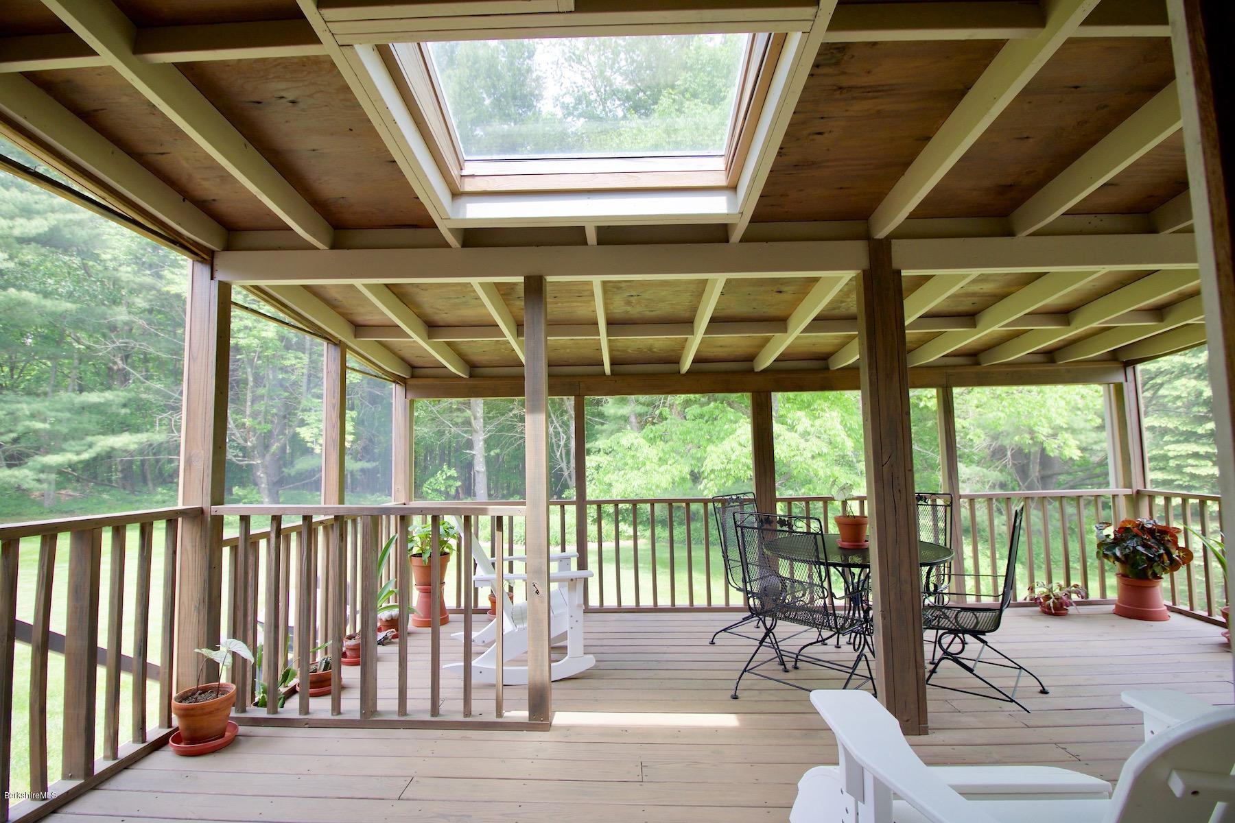 22 Old Barn Road Lenox, MA 01240 - Photo 15 of 37 a view of a porch with wooden floor
