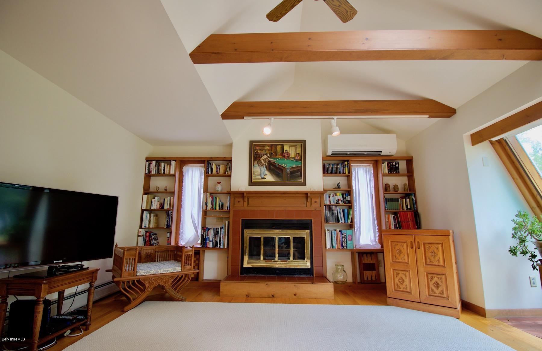 22 Old Barn Road Lenox, MA 01240 - Photo 18 of 37 a living room with furniture and a flat screen tv