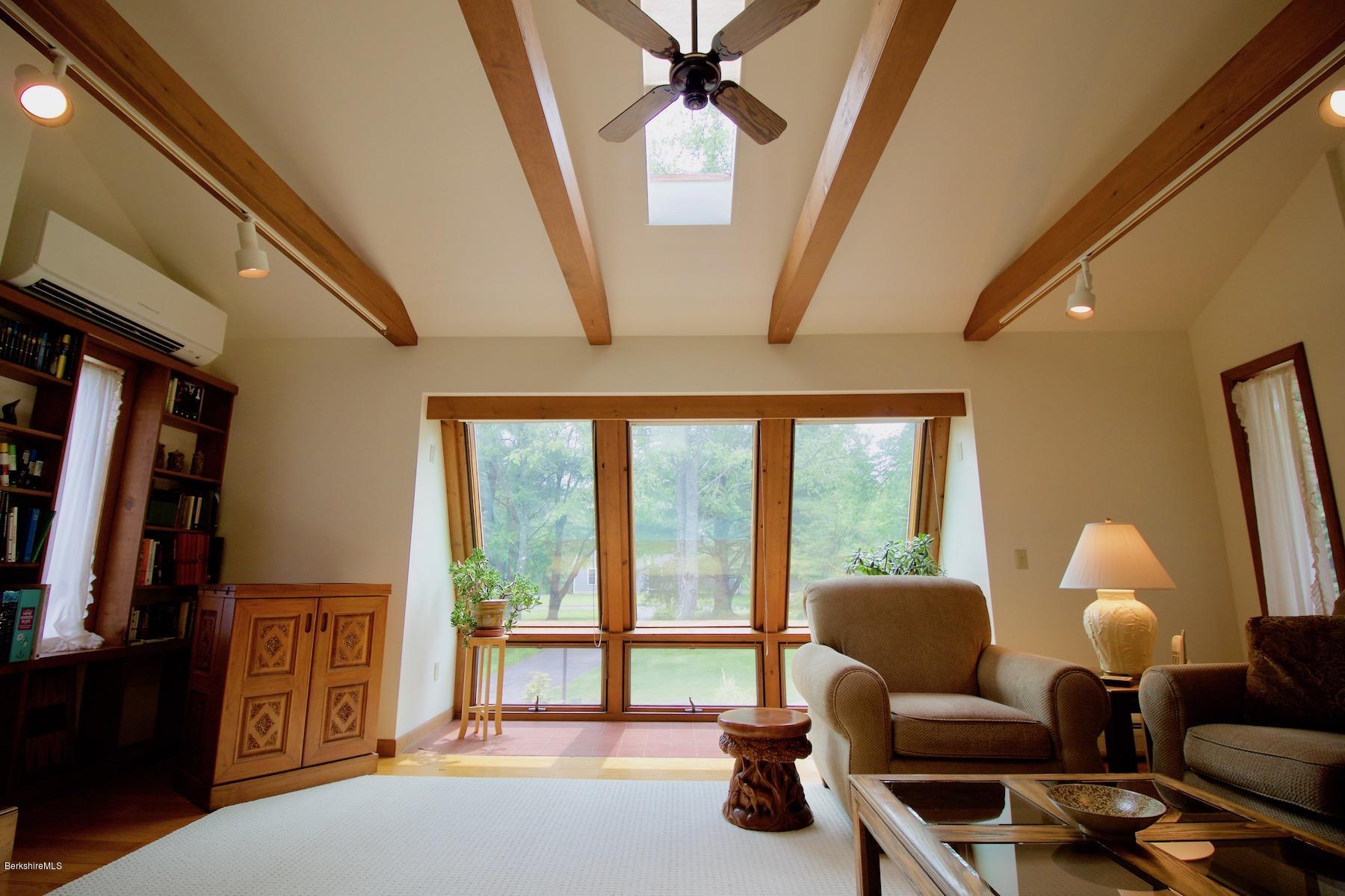 22 Old Barn Road Lenox, MA 01240 - Photo 19 of 37 a living room with furniture and a window