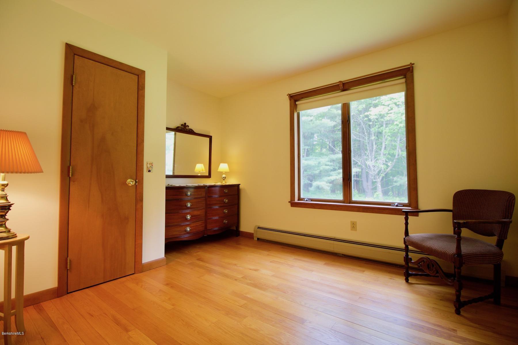 22 Old Barn Road Lenox, MA 01240 - Photo 32 of 37 a view of a workspace with furniture and a window