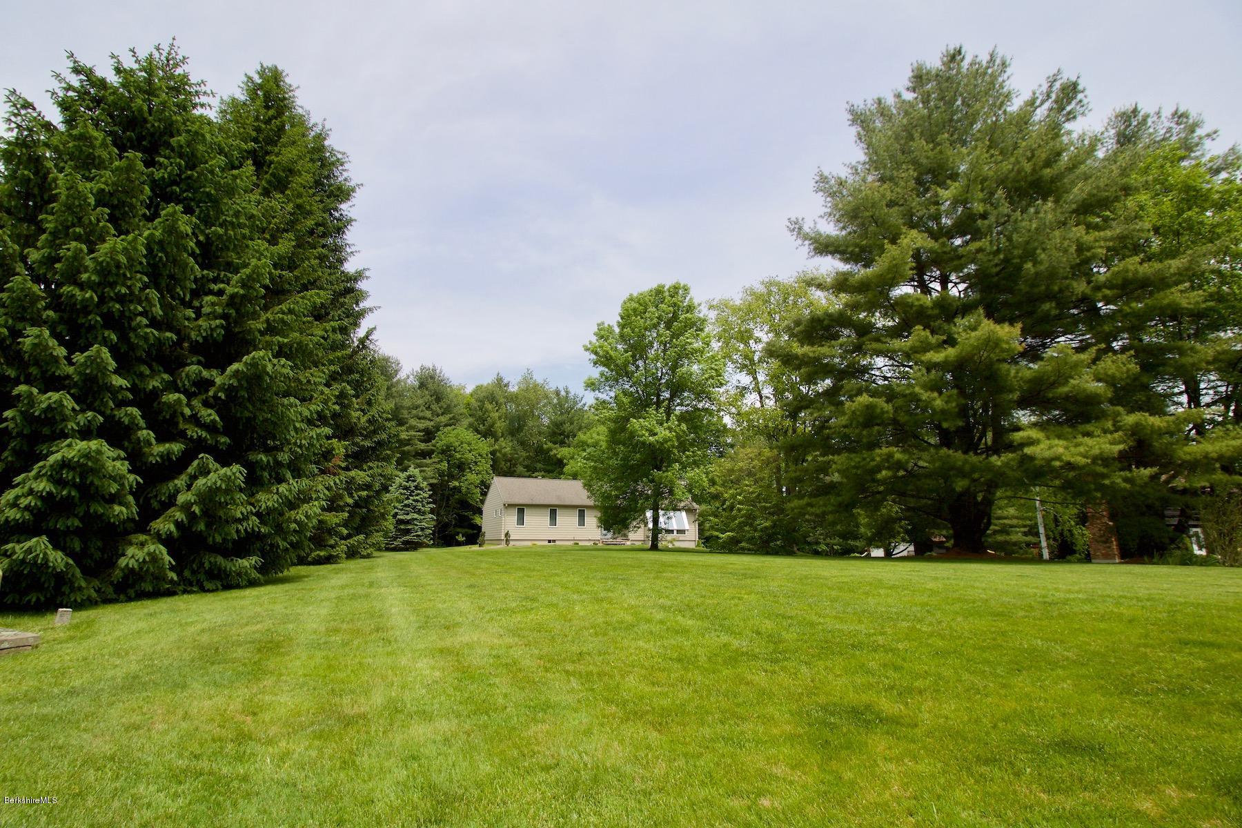 22 Old Barn Road Lenox, MA 01240 - Photo 6 of 37 a house view with a garden
