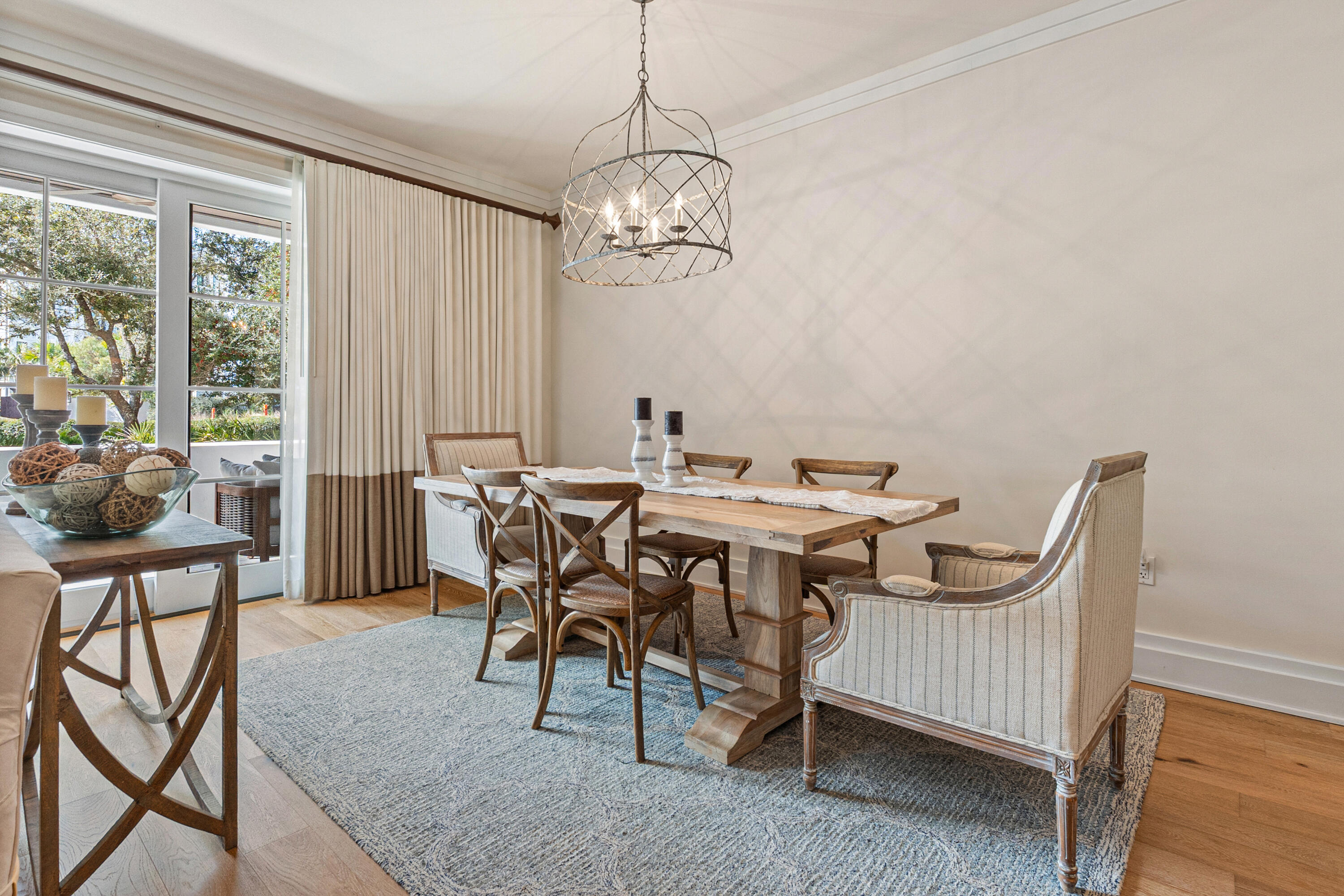8377 East County Highway 30A, Unit 103 Inlet Beach, FL 32461 - Photo 11 of 36 a view of a dining room with furniture window and outside view