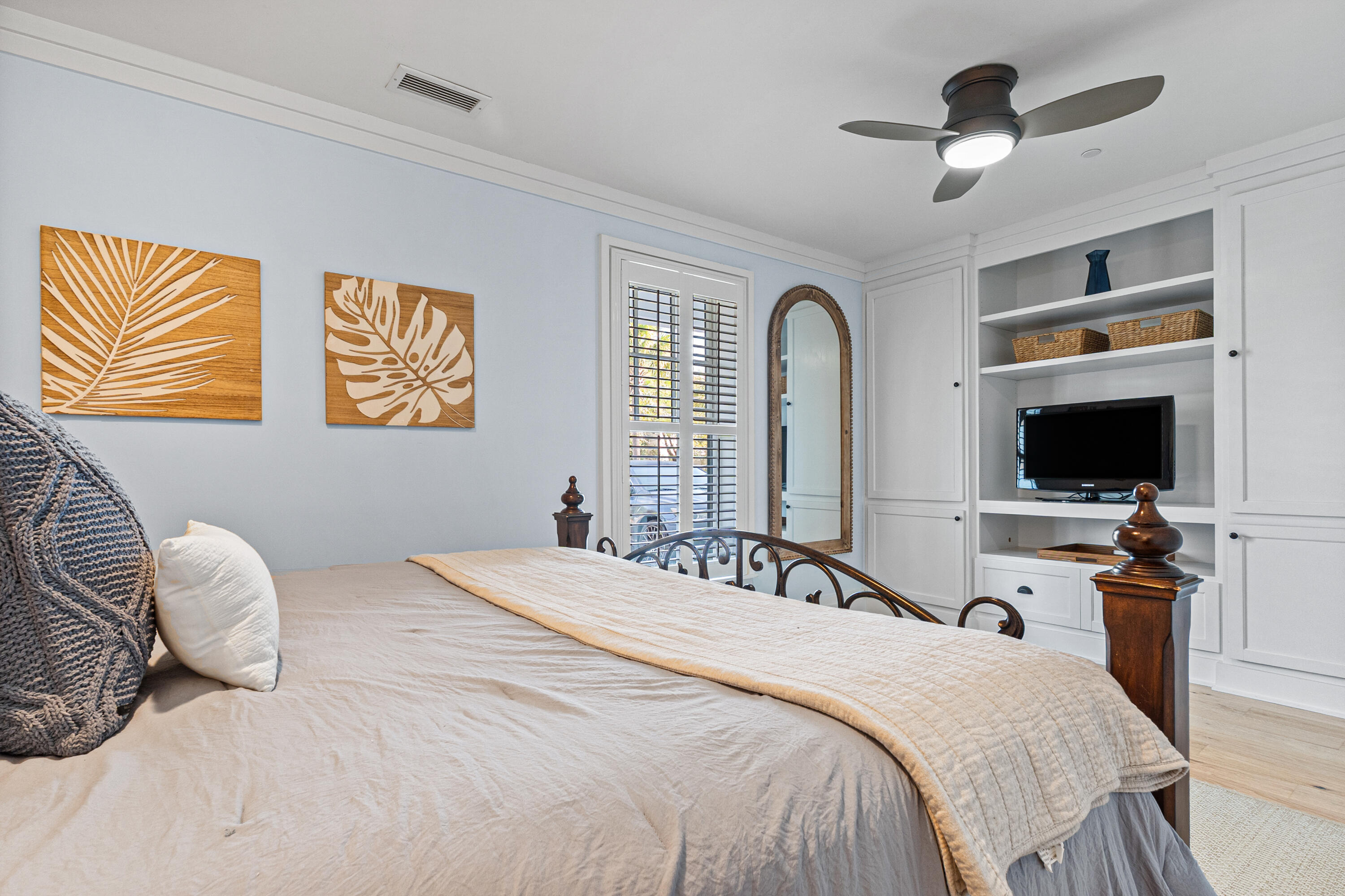 8377 East County Highway 30A, Unit 103 Inlet Beach, FL 32461 - Photo 14 of 36 a bedroom with a bed and a flat screen tv