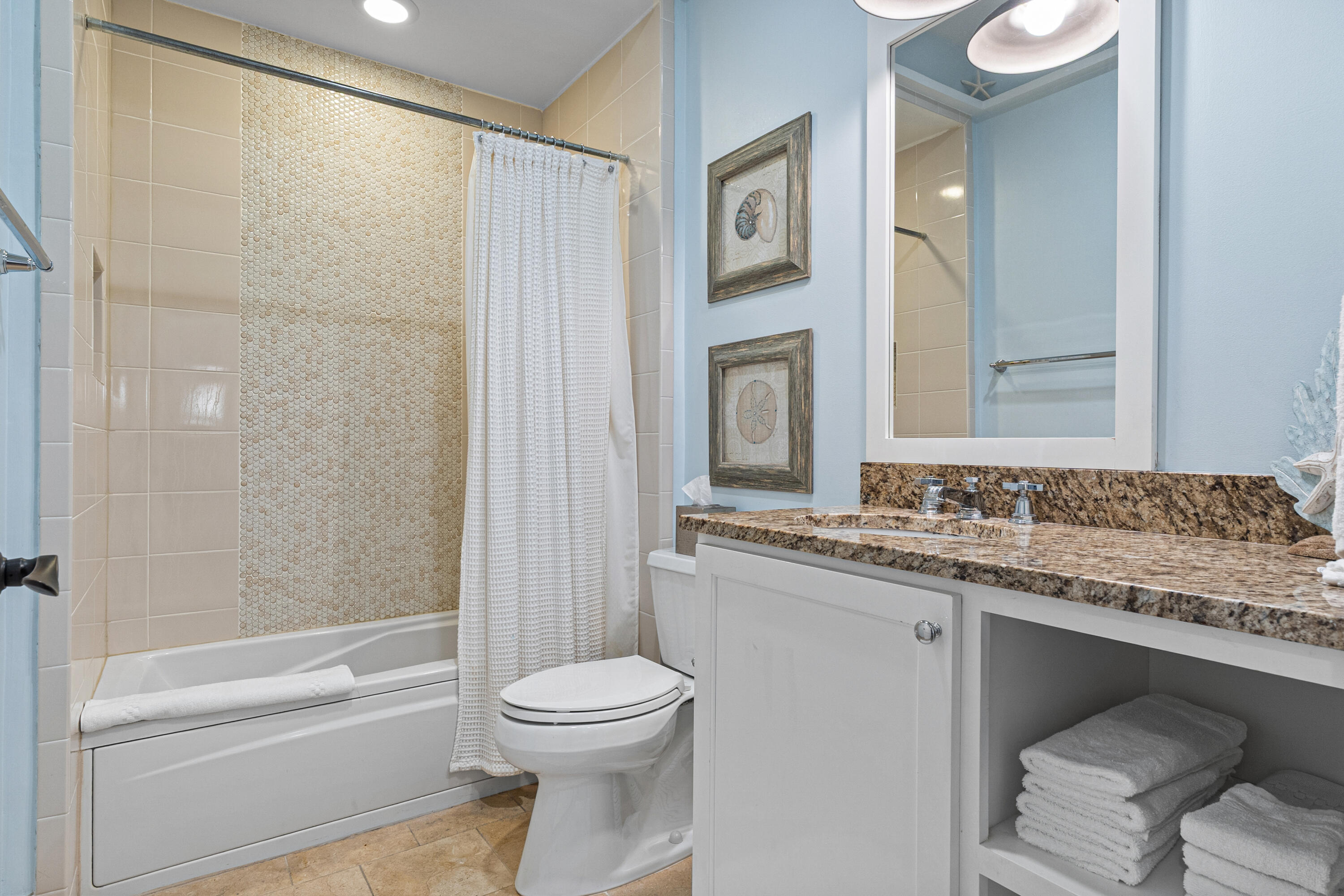 8377 East County Highway 30A, Unit 103 Inlet Beach, FL 32461 - Photo 16 of 36 a bathroom with a granite countertop sink toilet and shower