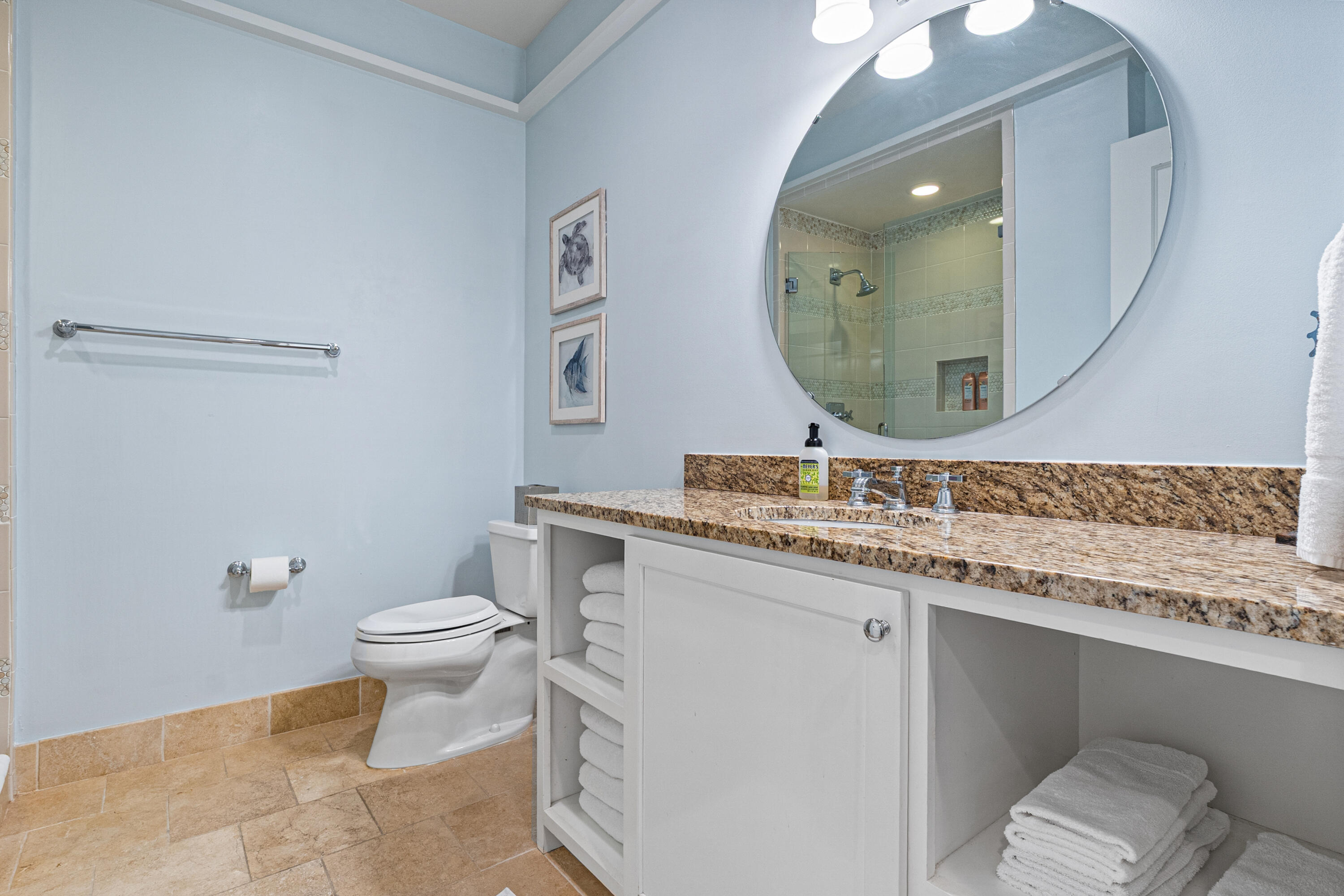 8377 East County Highway 30A, Unit 103 Inlet Beach, FL 32461 - Photo 17 of 36 a bathroom with a granite countertop toilet a sink and a mirror