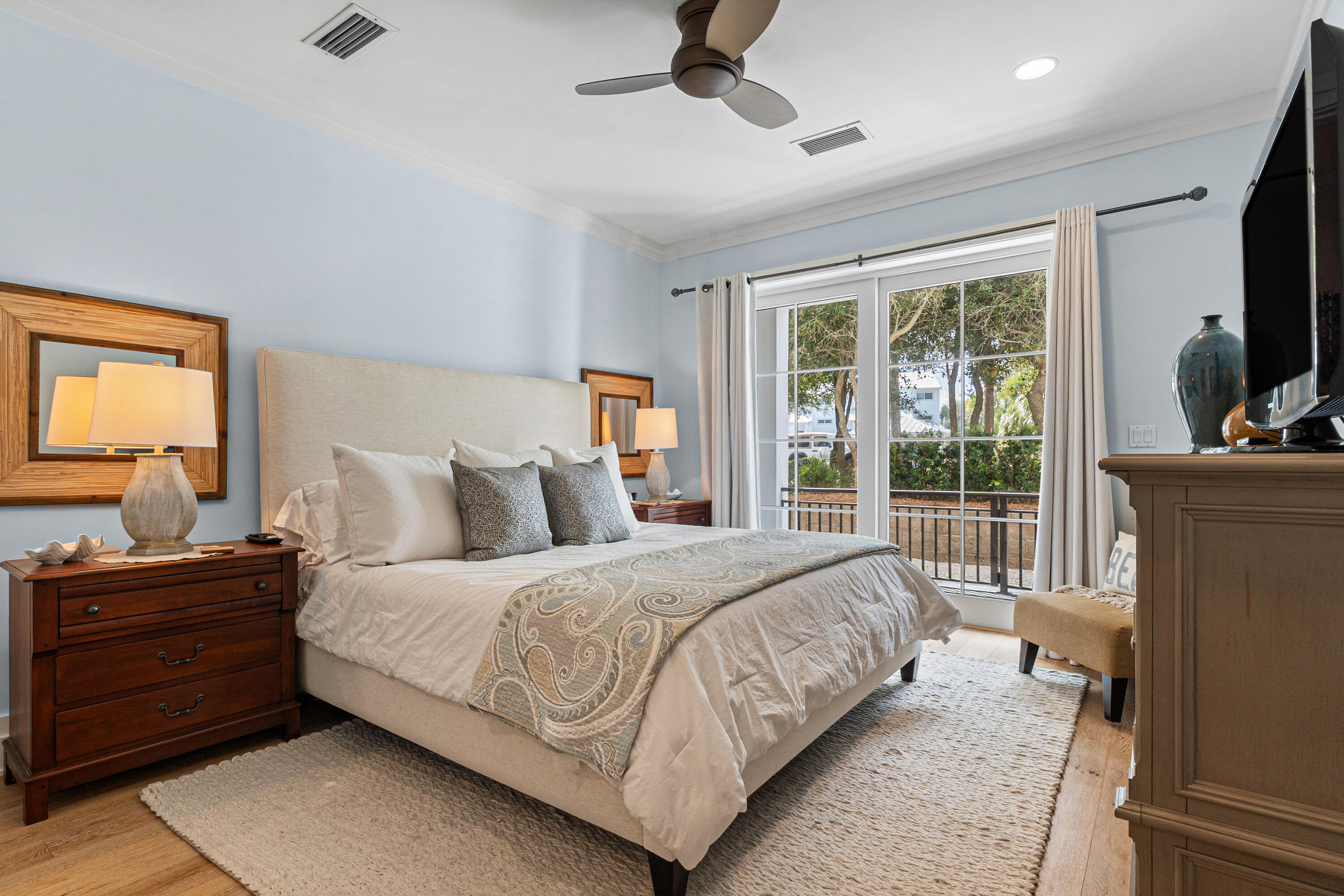 8377 East County Highway 30A, Unit 103 Inlet Beach, FL 32461 - Photo 20 of 36 a bedroom with a bed and a dresser