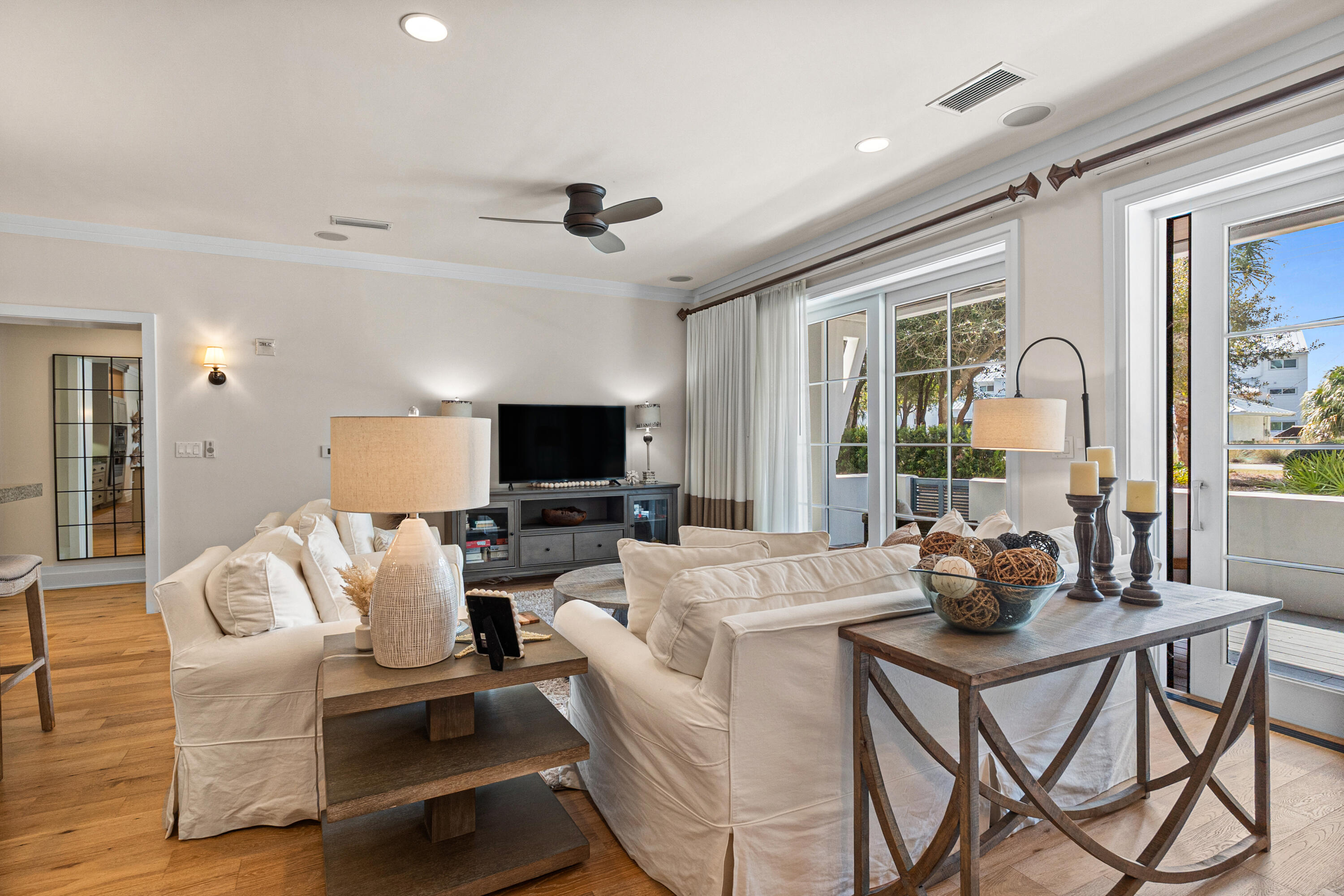 8377 East County Highway 30A, Unit 103 Inlet Beach, FL 32461 - Photo 10 of 36 a living room with furniture and a flat screen tv