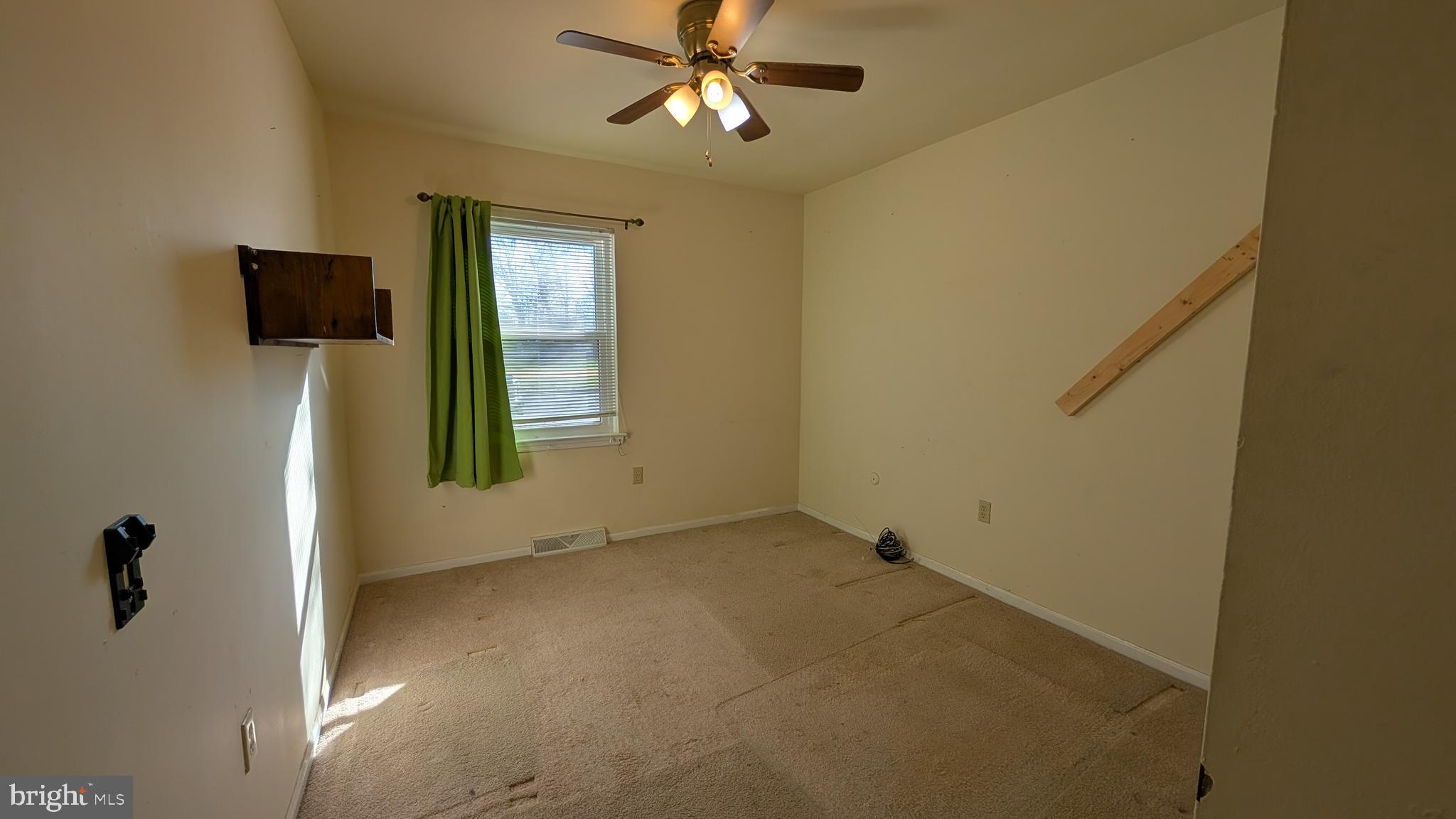 308 Spohn Road Reading, PA 19608 - Photo 11 of 25 an empty room with windows and closet