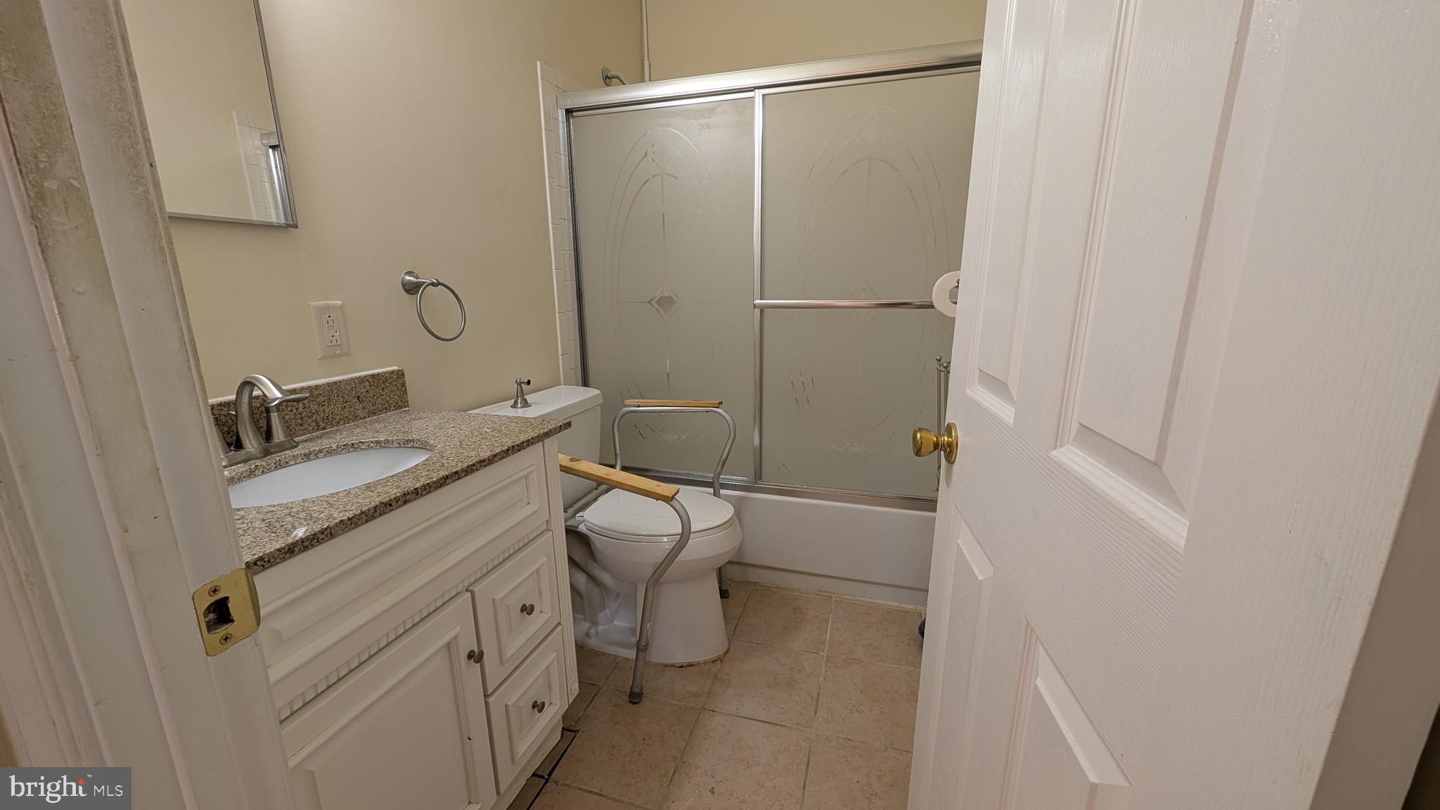 308 Spohn Road Reading, PA 19608 - Photo 14 of 25 a bathroom with a granite countertop sink toilet and shower