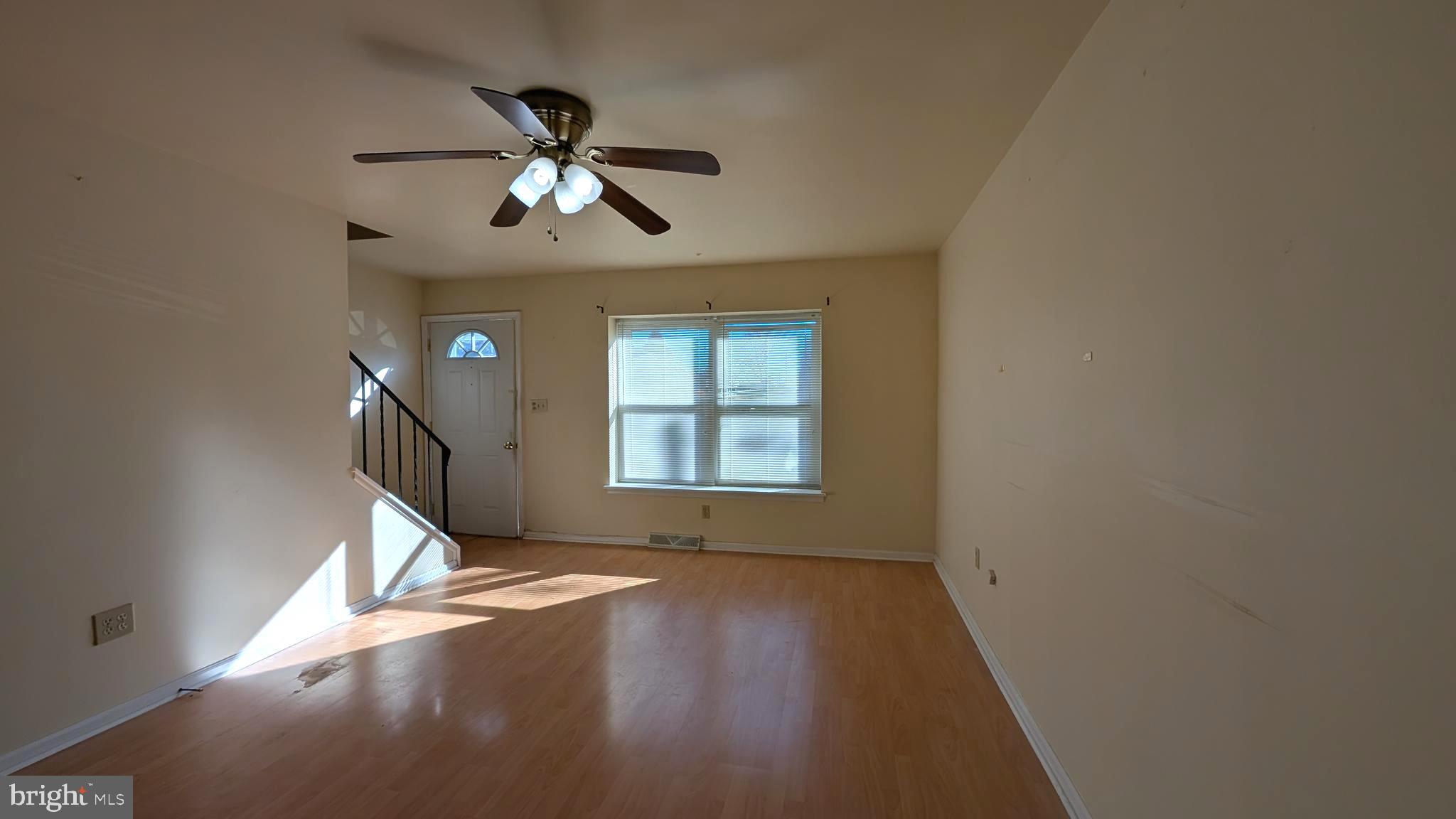 308 Spohn Road Reading, PA 19608 - Photo 5 of 25 a view of empty room with wooden floor and fan