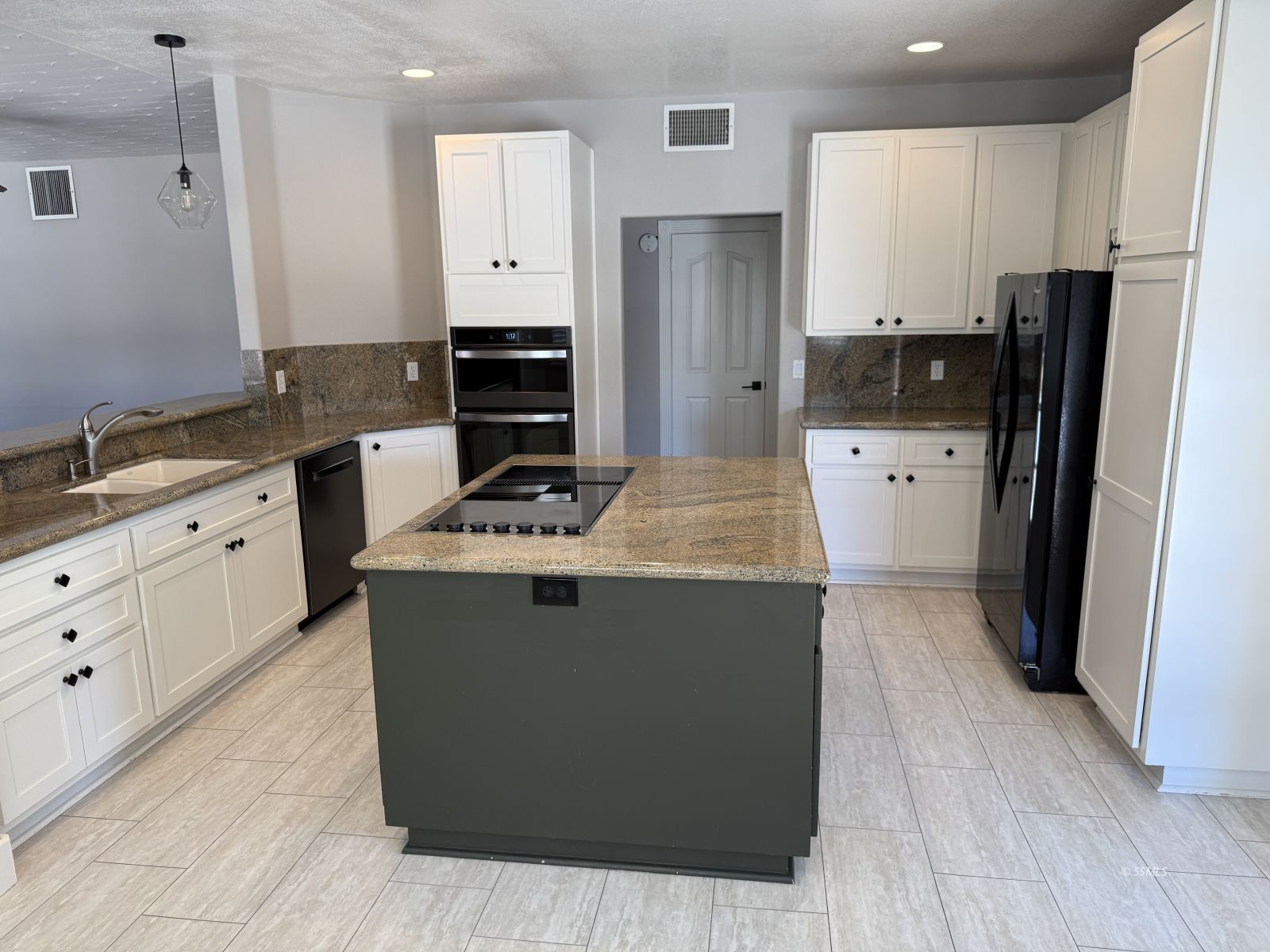 413 Laurkris Court Ridgecrest, CA 93555 - Photo 3 of 48 a kitchen with stainless steel appliances a refrigerator sink and cabinets