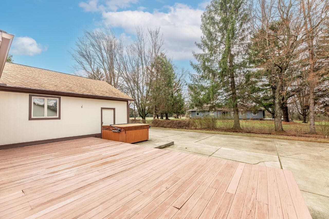 3744 Hazelton-Etna Road Southwest Pataskala, OH 43062 - Photo 42 of 87 Deck with a 6-person Island Spa hot tub