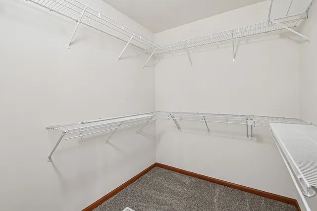 a view of a room with racks on the wall