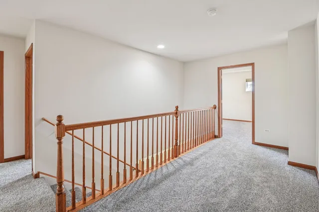 a view of a hallway with a window