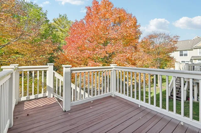 a view of a wooden roof deck