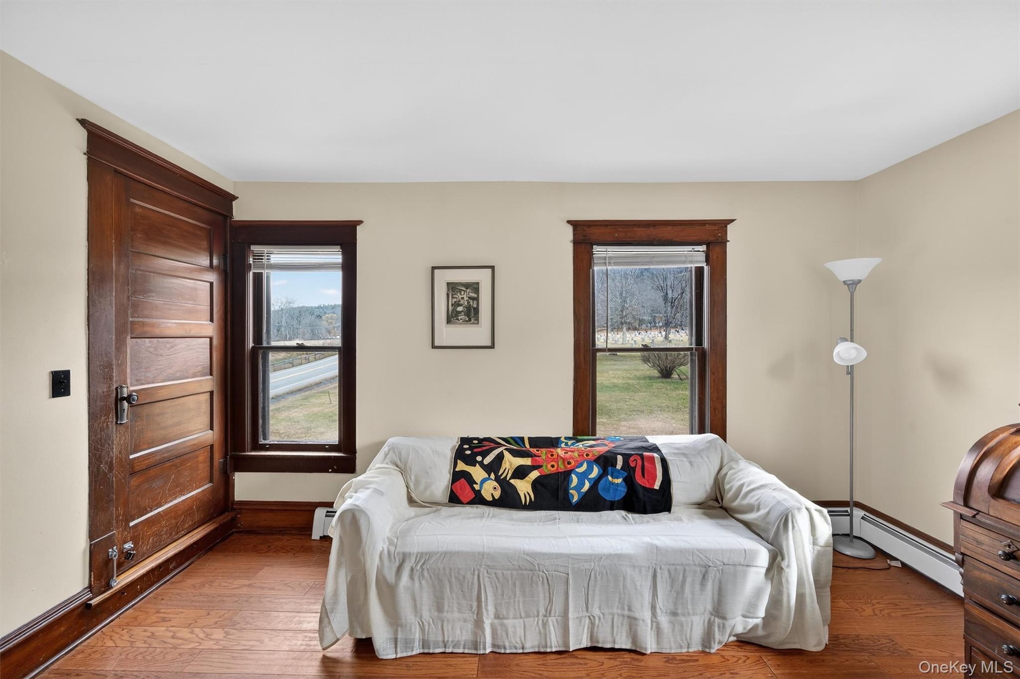 48 Kirks Road Narrowsburg, NY 12764 - Photo 17 of 50 a bedroom with a bed and a window