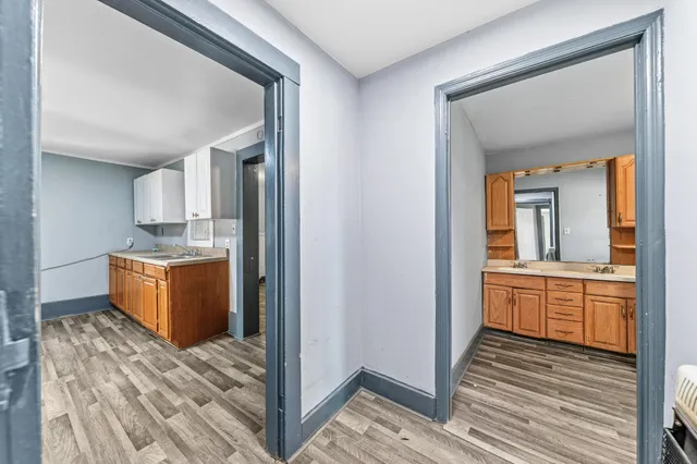 a view of a kitchen from the hallway