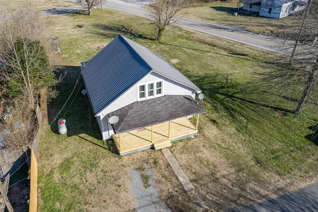 a view of house with outdoor space