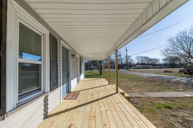 a view of swimming pool with seating space